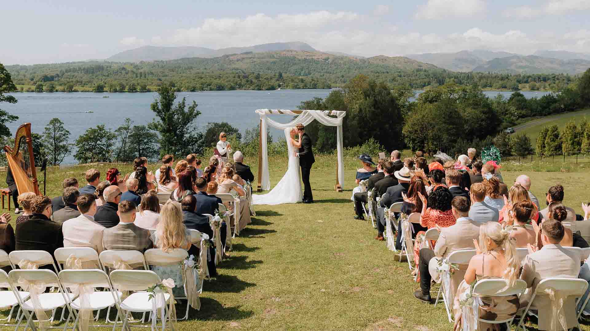 Louise and James' wedding ceremony on the infinity platform at Low Wood Bay