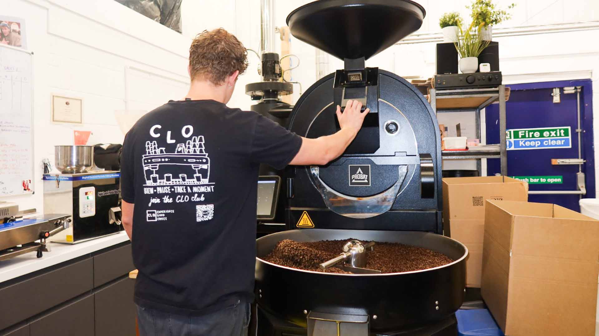 Operator at a machine in a coffee roastery