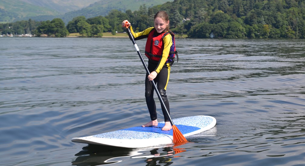 Learning to paddle board on Lake Windermere 