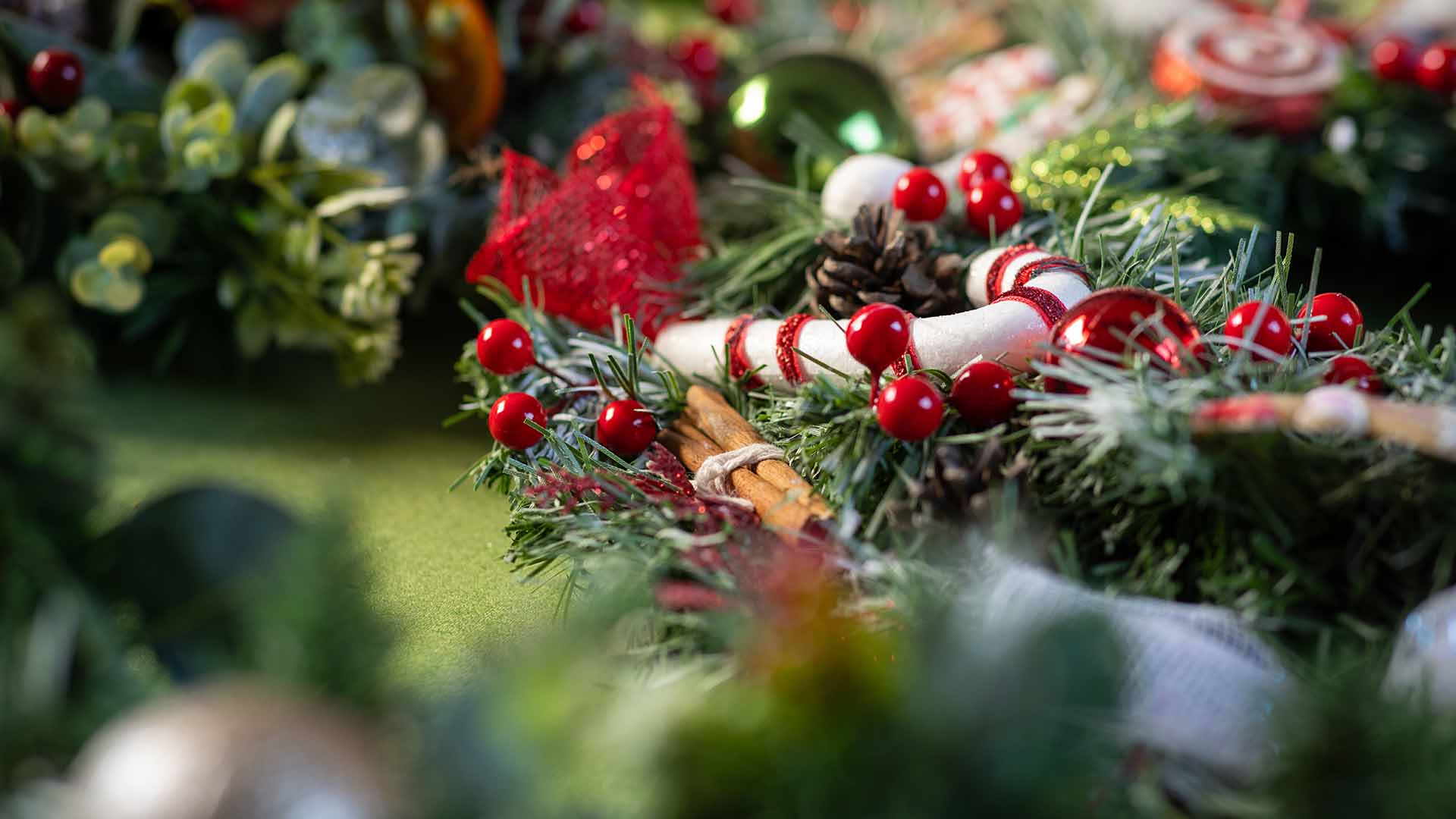 Christmas wreath making items on a table