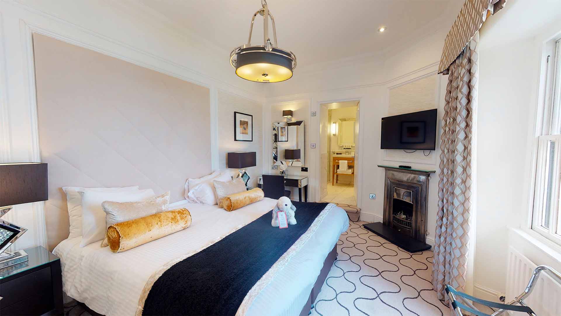 An Oak Suite hotel bedroom at Low Wood Bay Resort & Spa