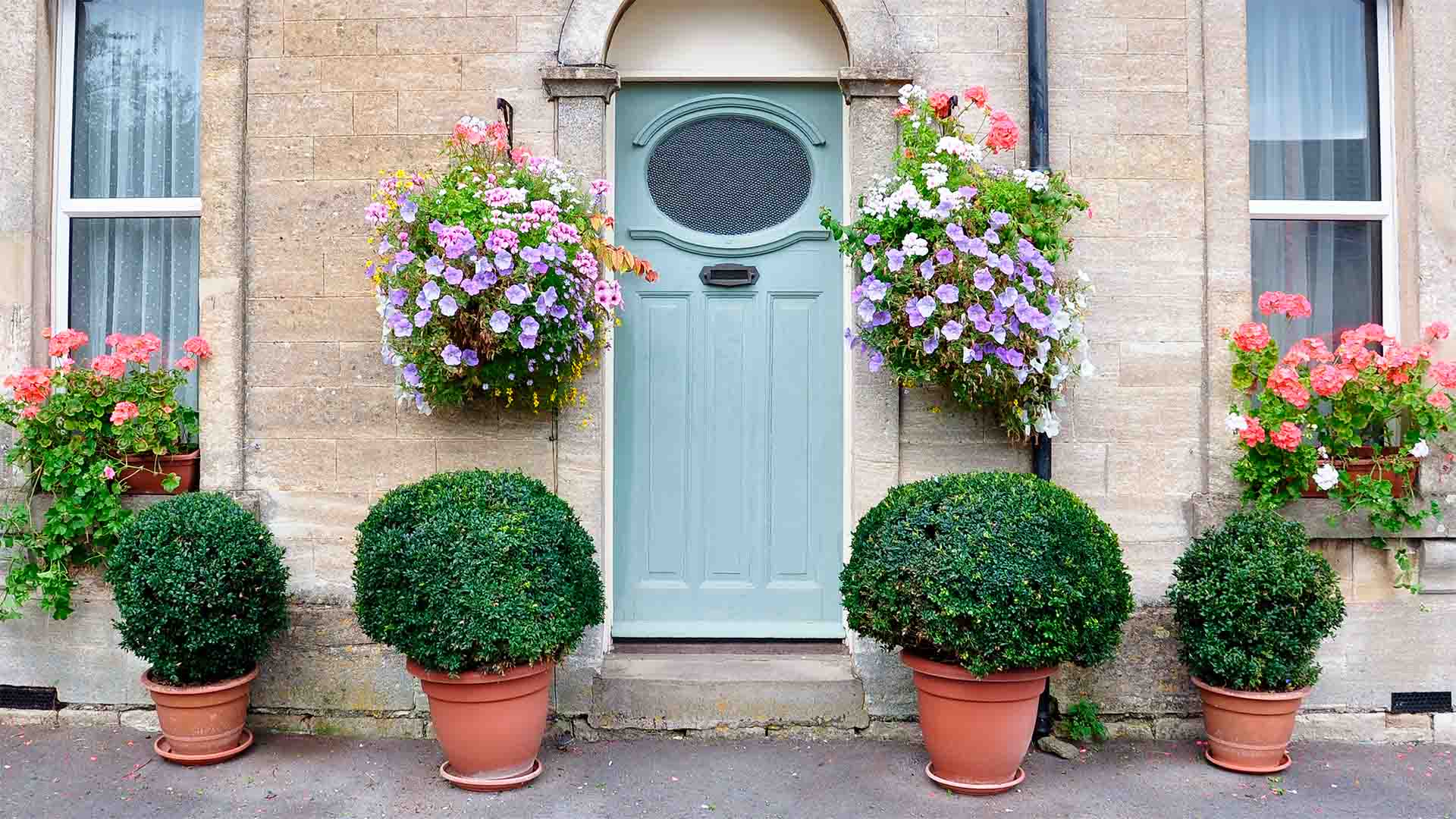 Hanging baskets by the door