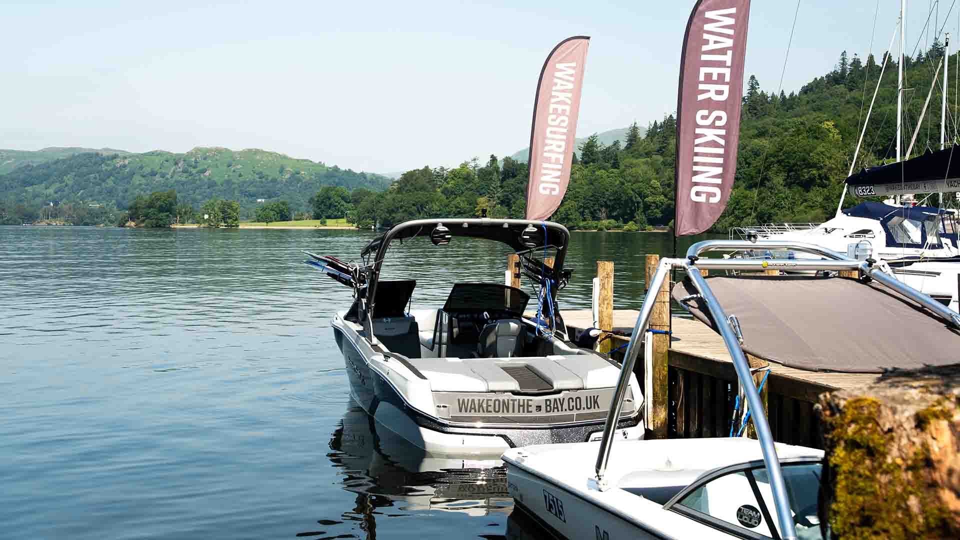 Wake on the bay boat moored at Low Wood Bay