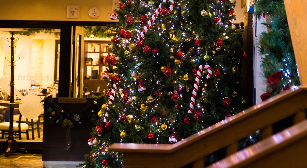 Christmas tree aside the hotel staircase at Lancaster House