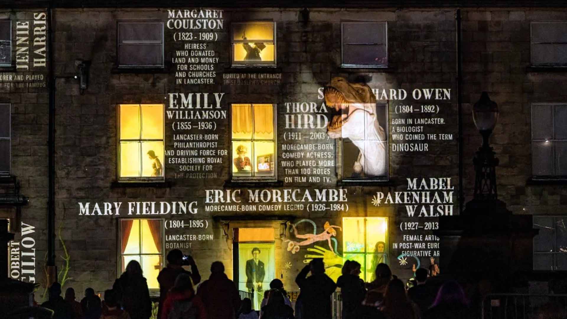 Images projected onto the front of a building in Dalton Square, Lancaster