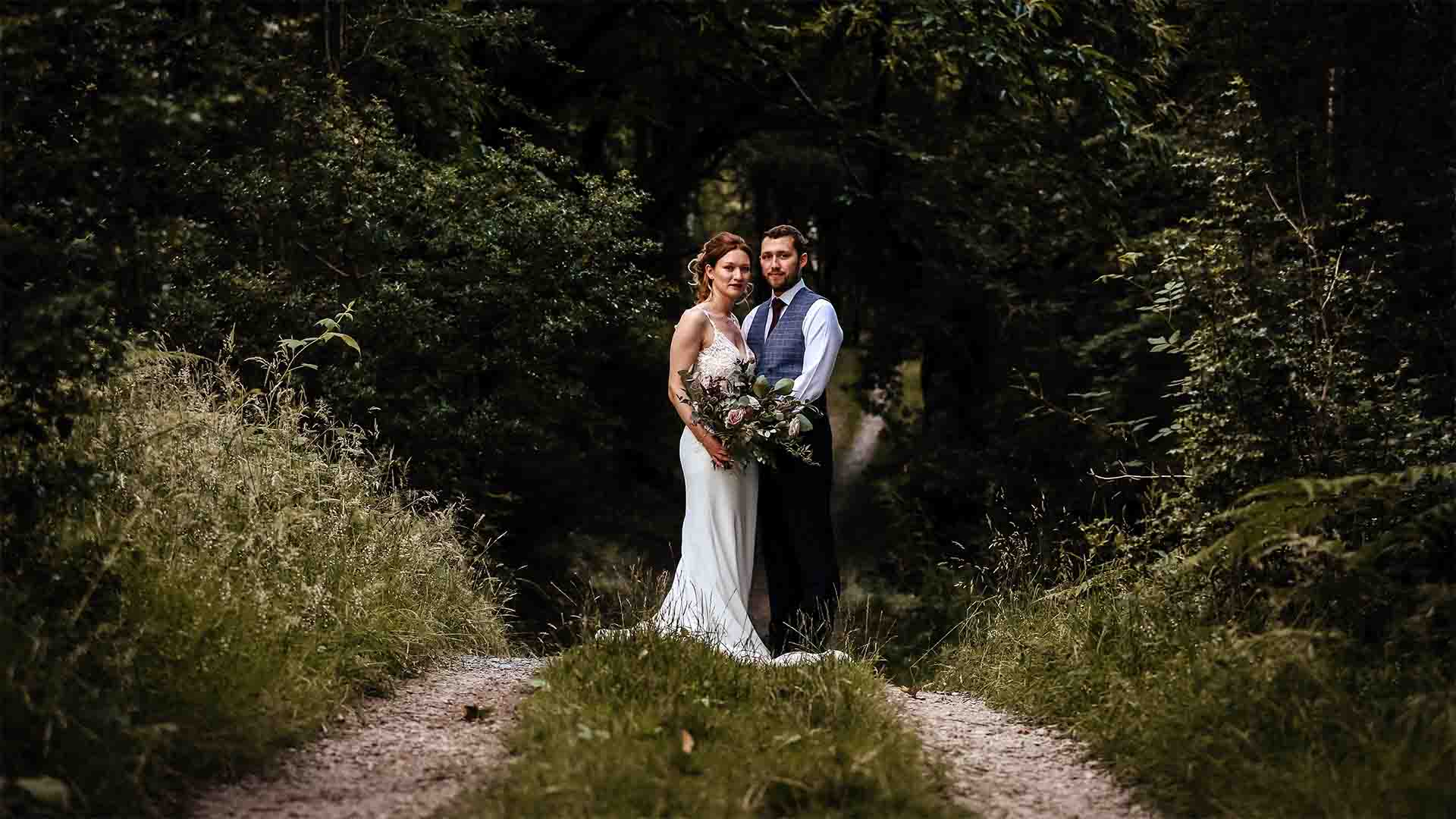 Ali & Jack stood in the path in the woods