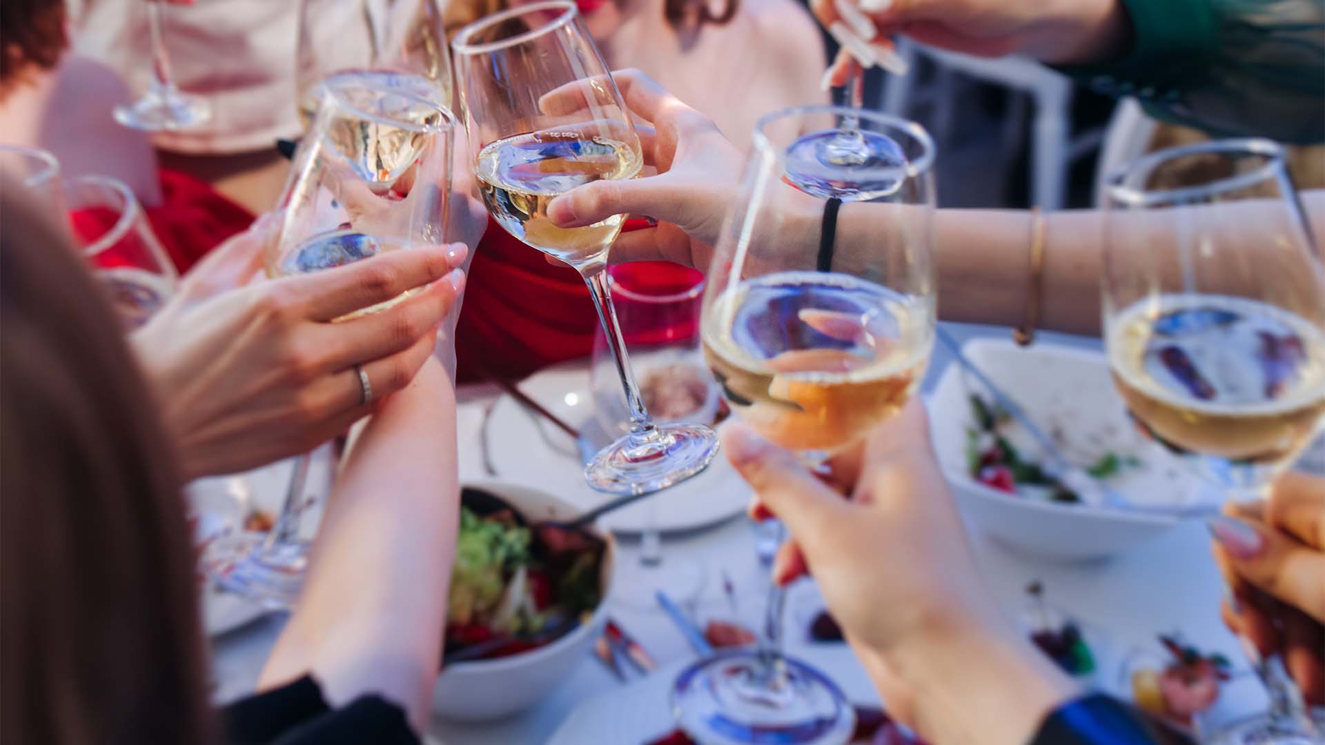 Glasses raised in a toast