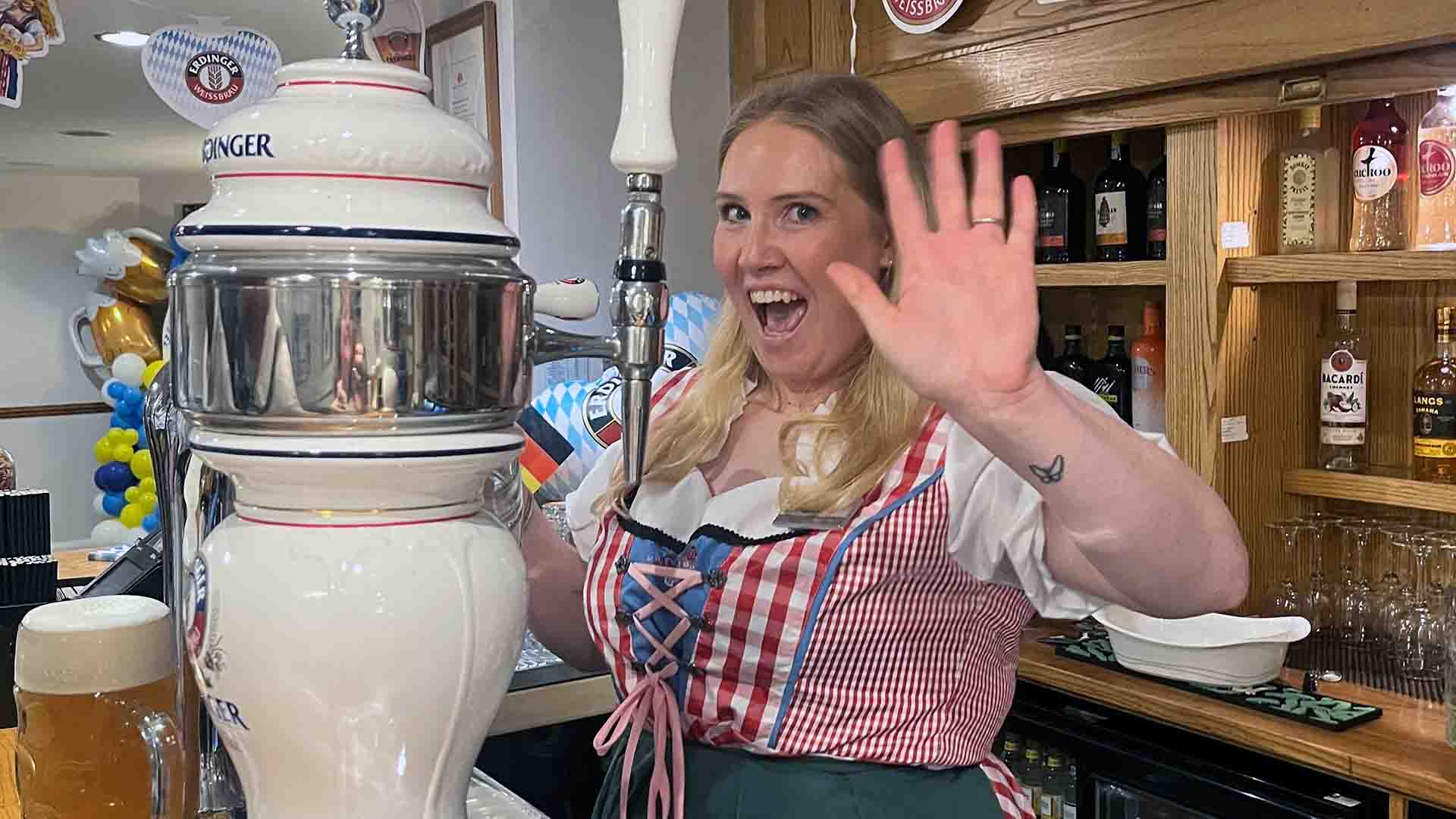 Barmaid pulling a beer at the Oktoberfest event