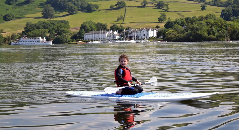Learning to paddle board on Windermere
