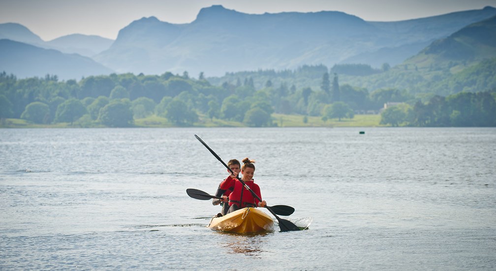 Couple on a sit on Kayak on Windermere