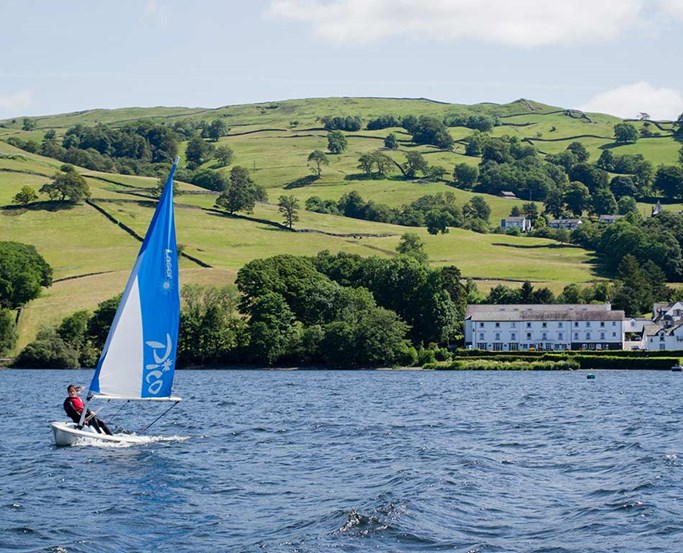 Sailing on Lake Windermere with Low Wood Bay behind