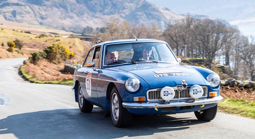 Blue MGB GT riding by Buttermere