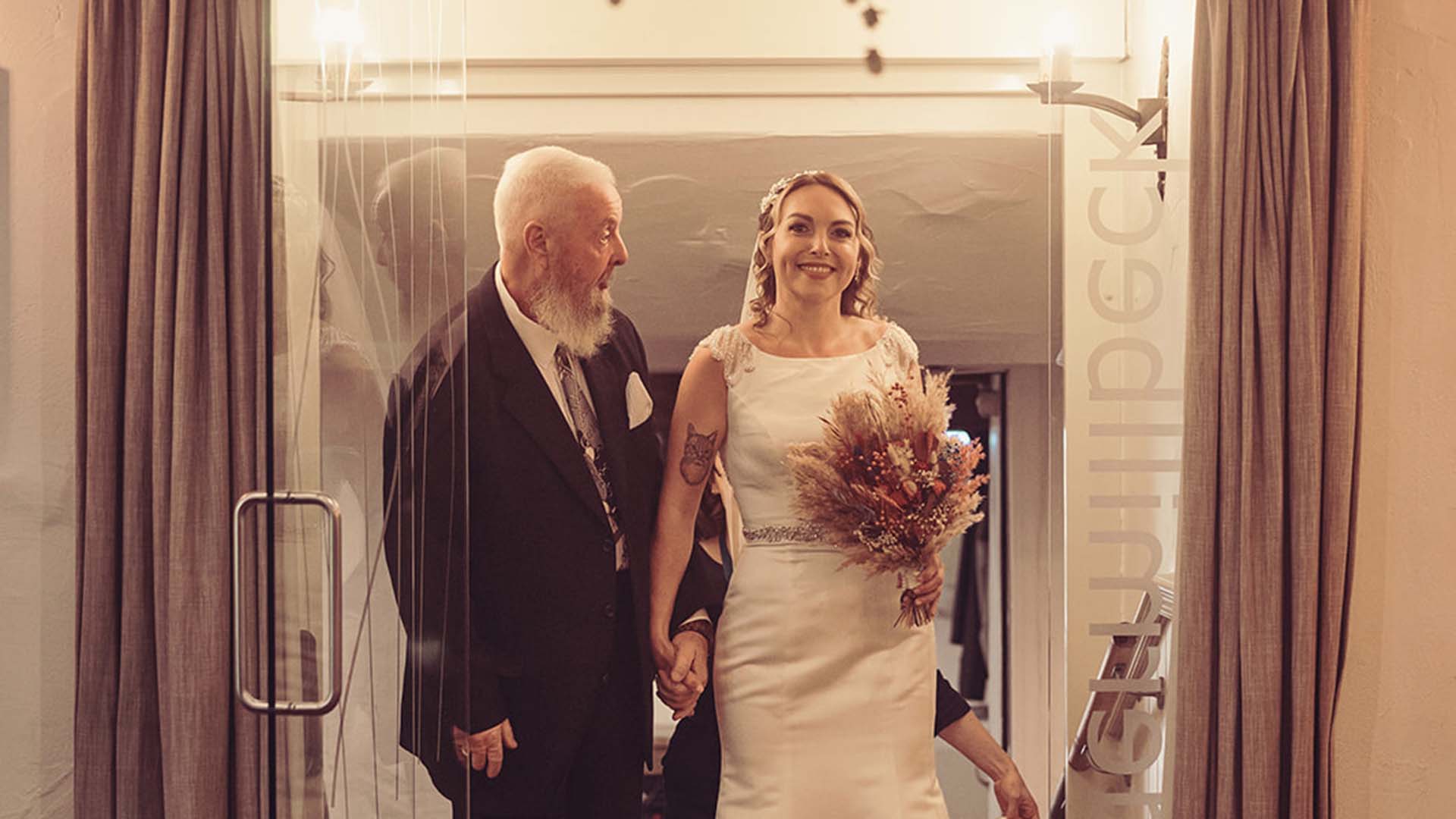 Bride and her father entering the Undermillbeck room