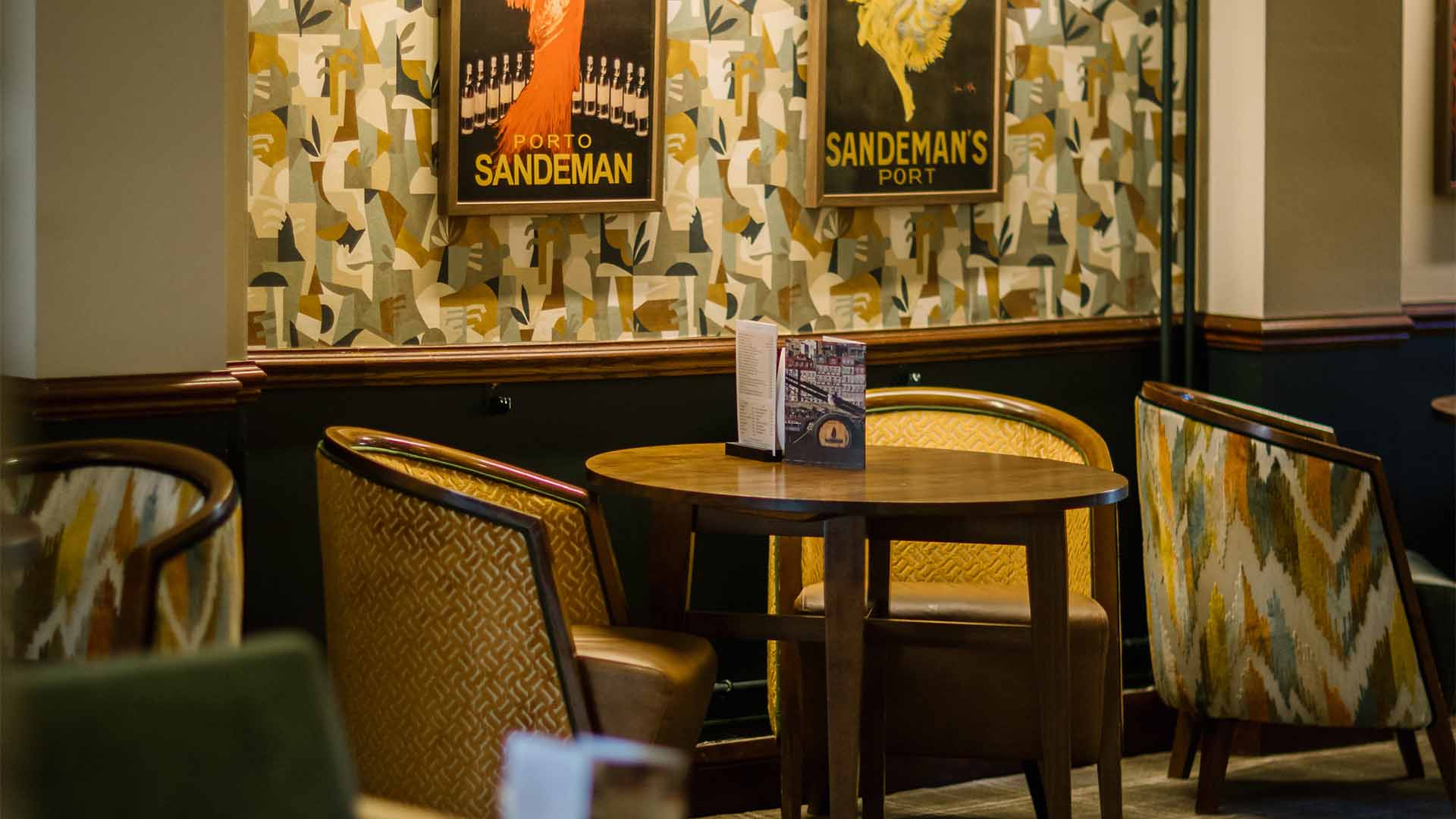 Wallart and seats in the Sandeman Bar