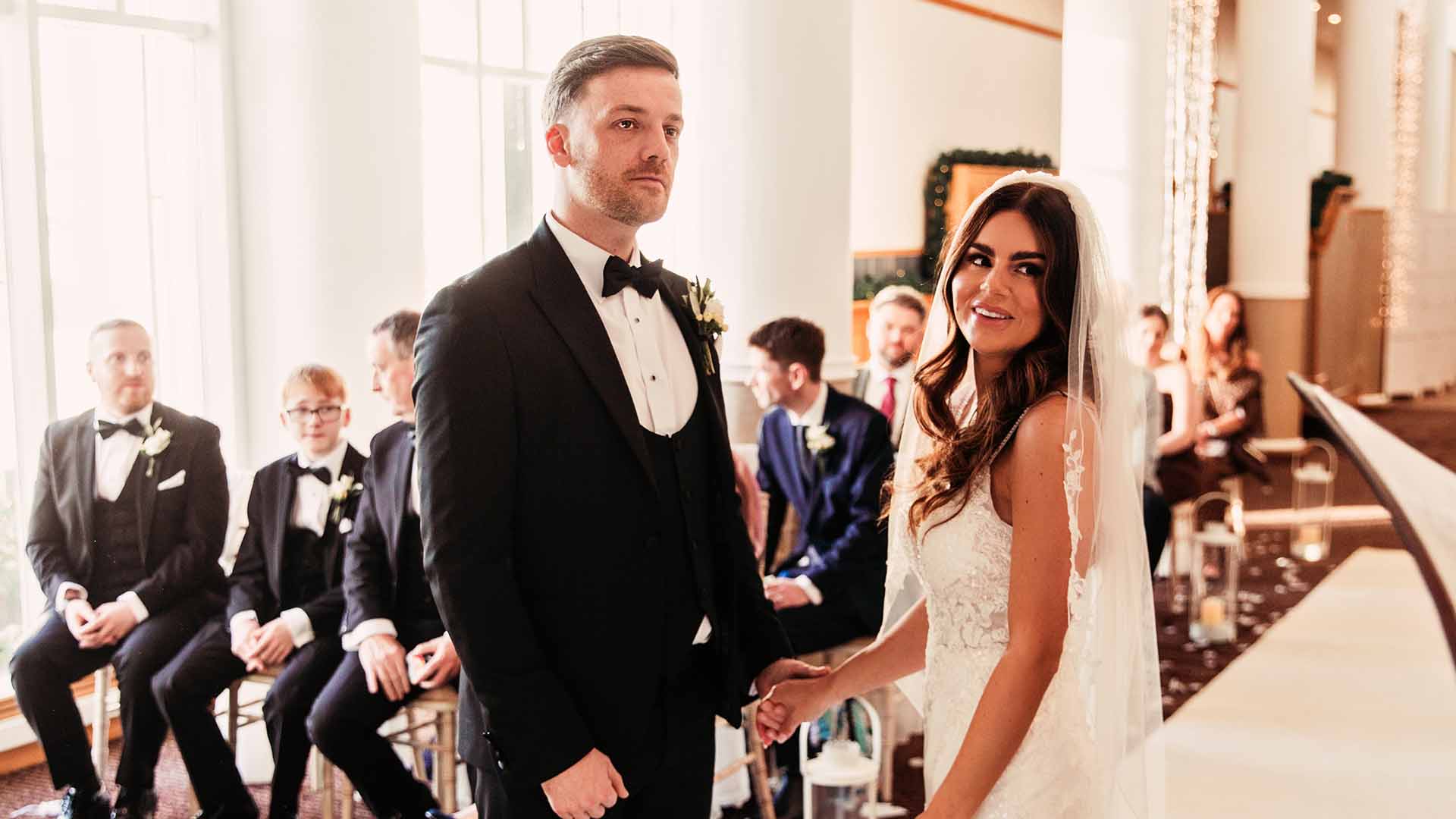 Nicola and Andrew on their wedding day in the Gallery Lounge at Low Wood Bay