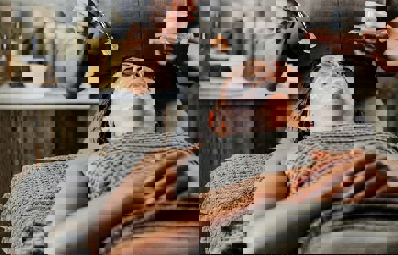 A young woman receiving a facial treatment in the Spa at Low Wood Bay