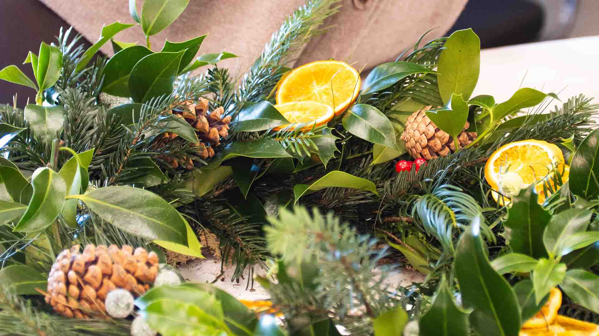 Christmas wreath making items on a table
