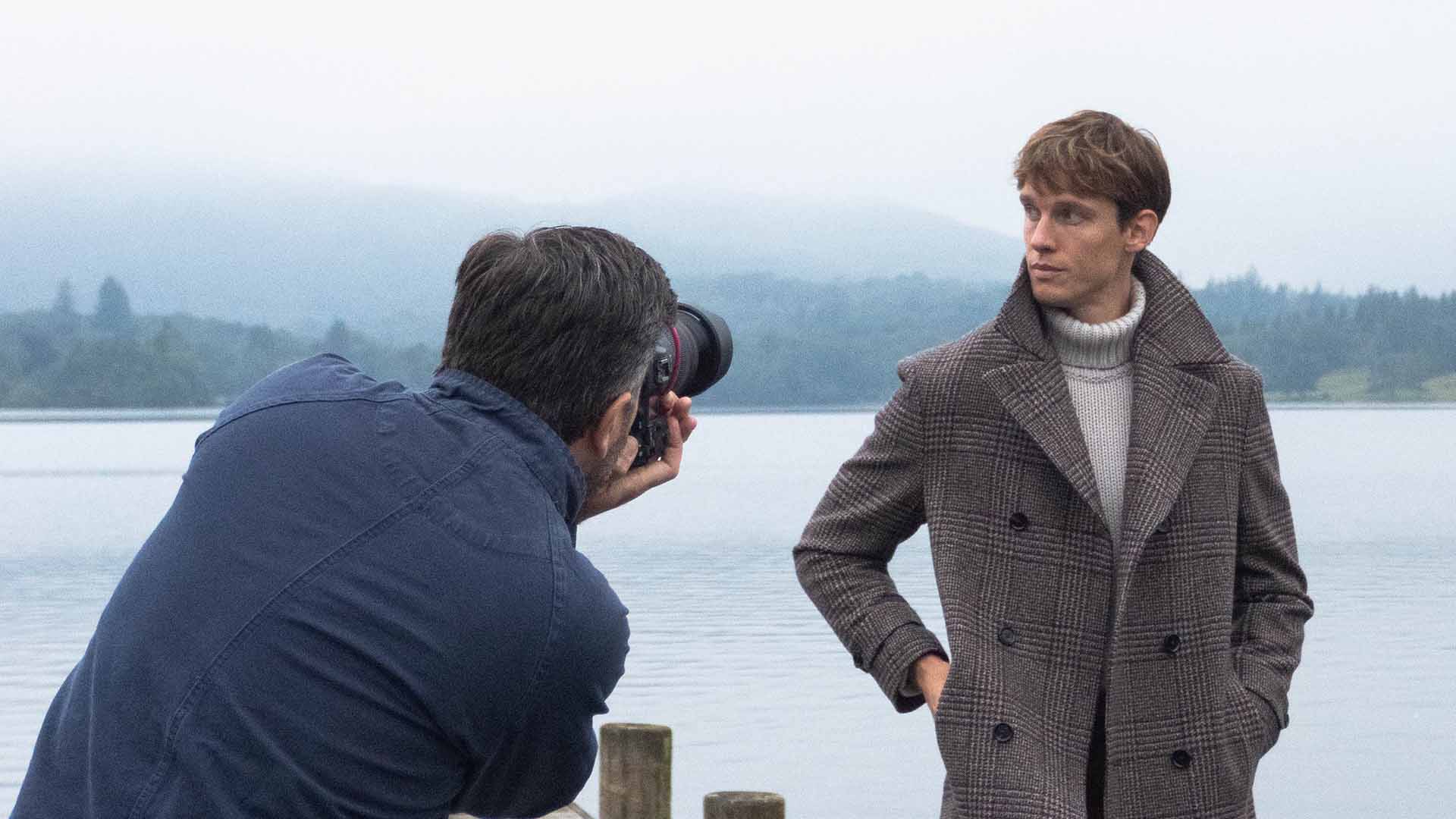 Model and photographer on the hotel jetty