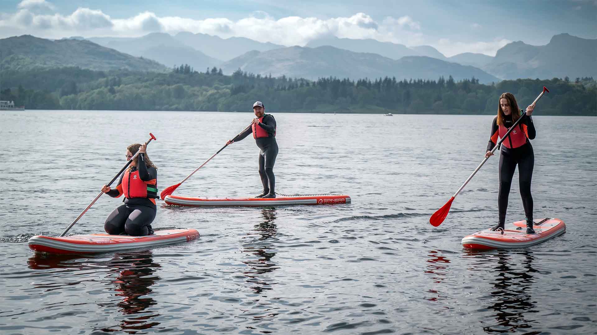 Small group on paddleboards on lake Windermere