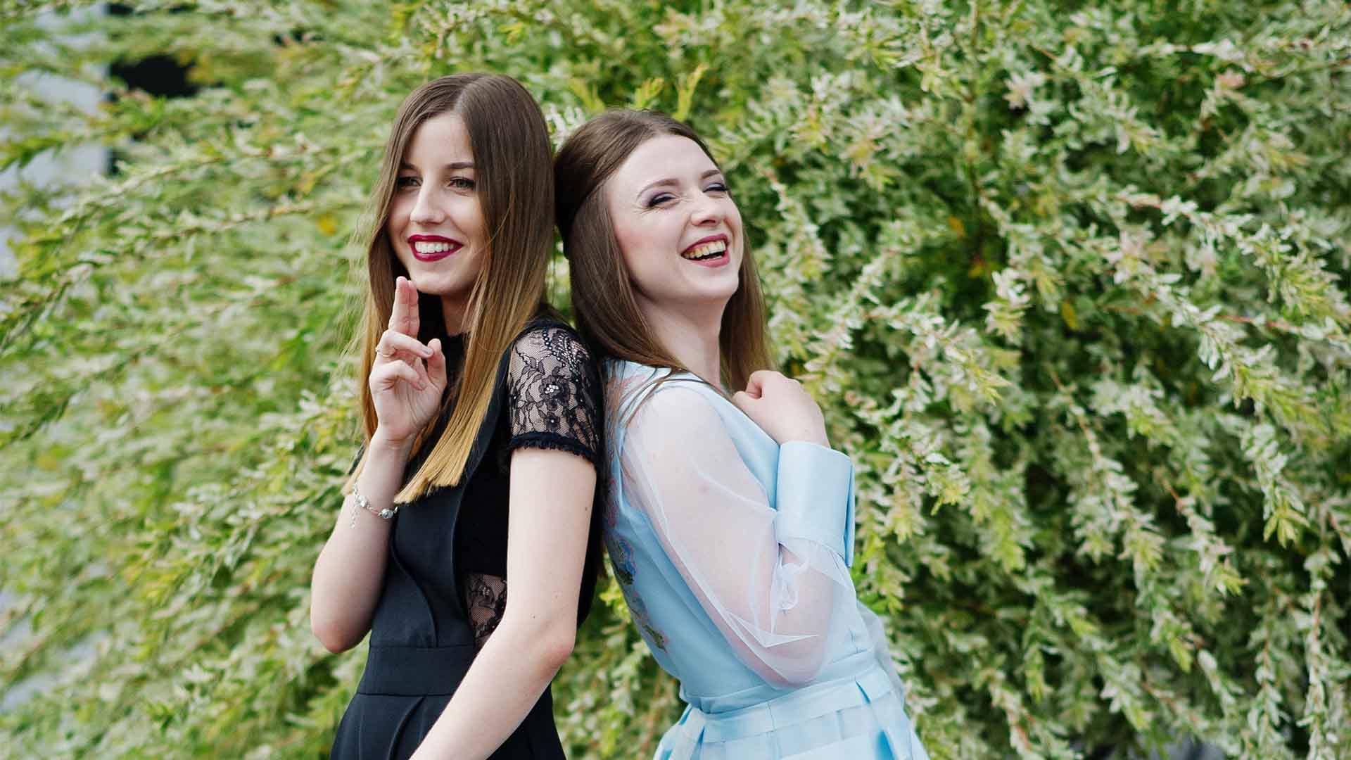 Two young women dressed for their prom