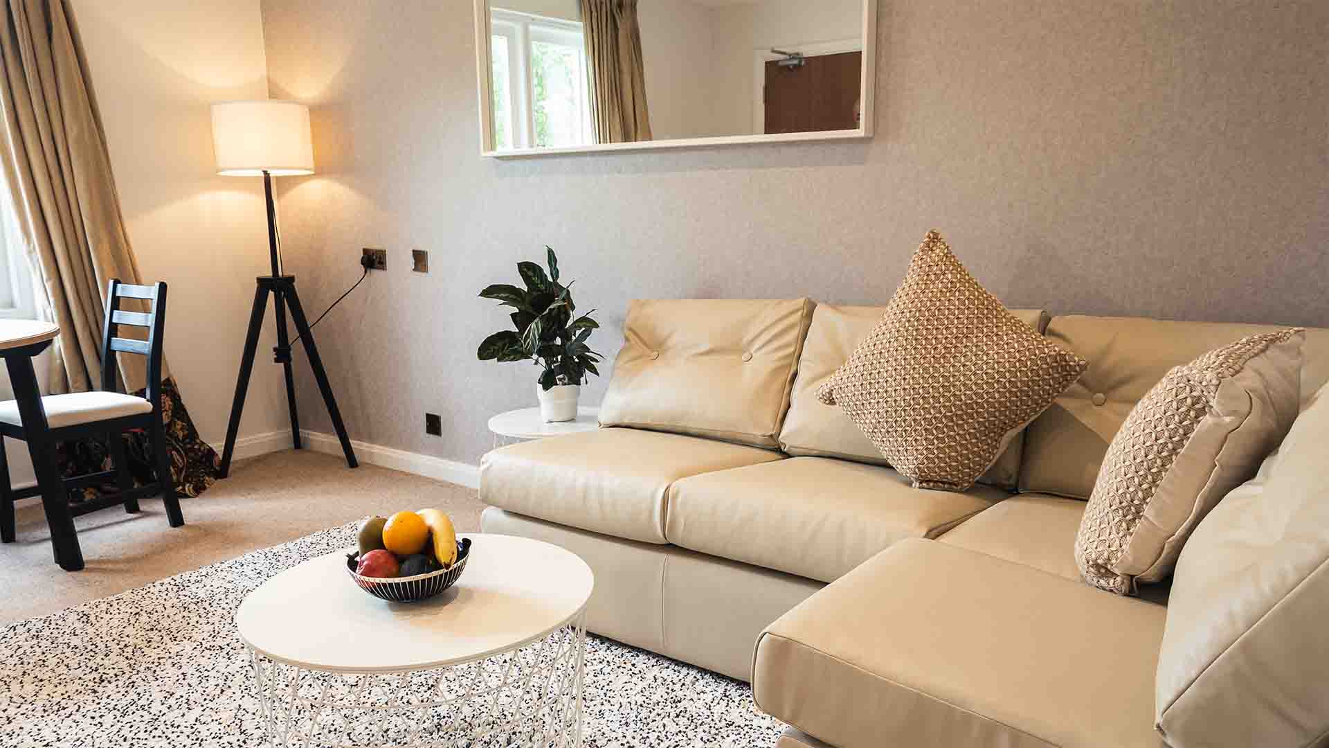 The lounge of a one bedroom apartment at Lancaster House Hotel