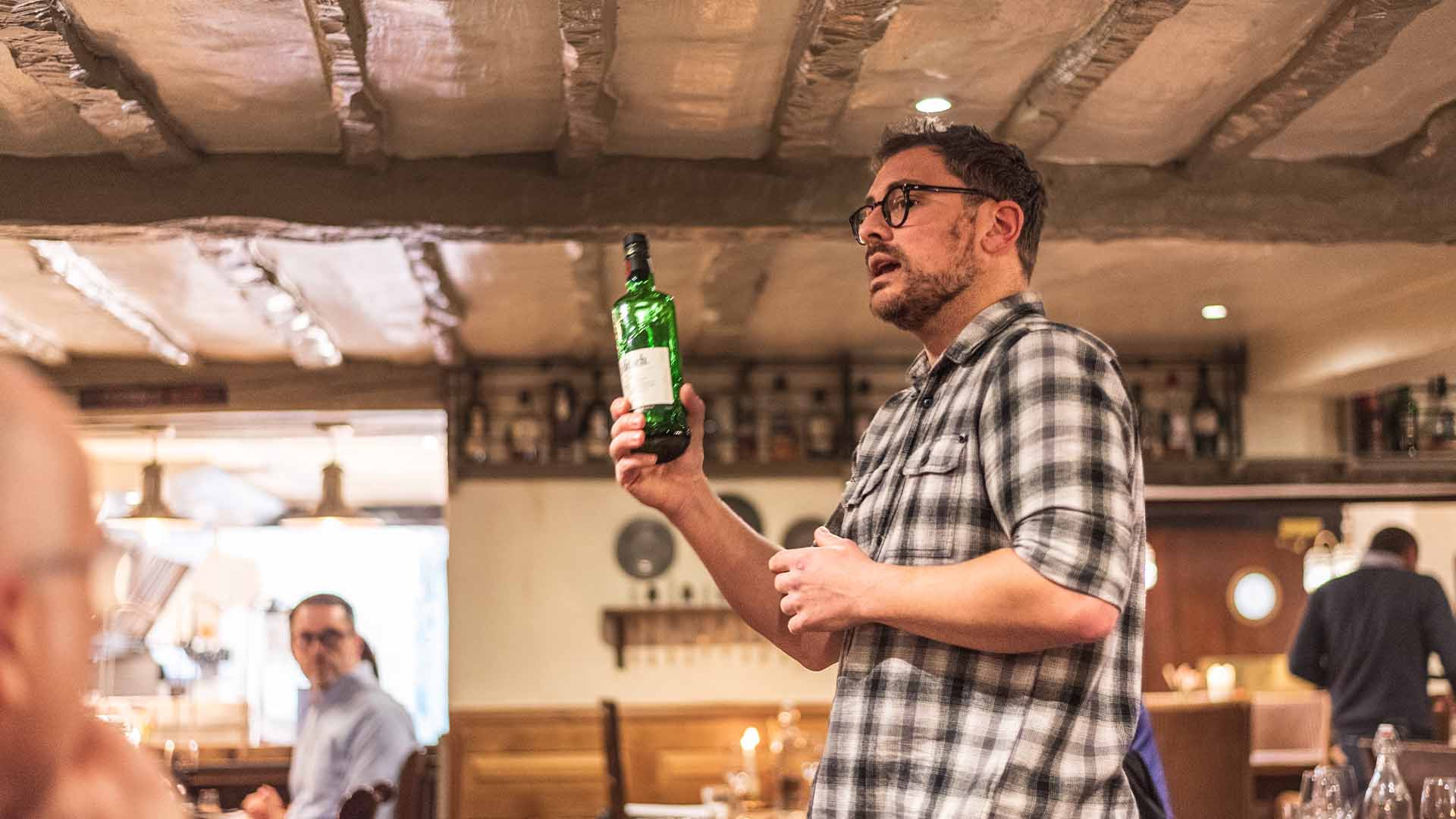 Alex Walker delivering the evening's presentation