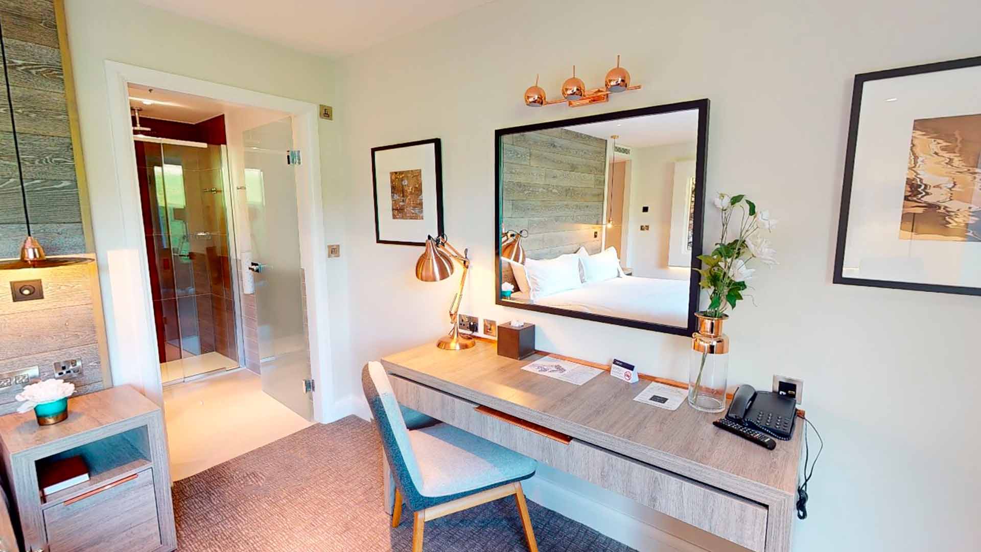 A Winander Club Lime bedroom at Low Wood Bay Resort & Spa