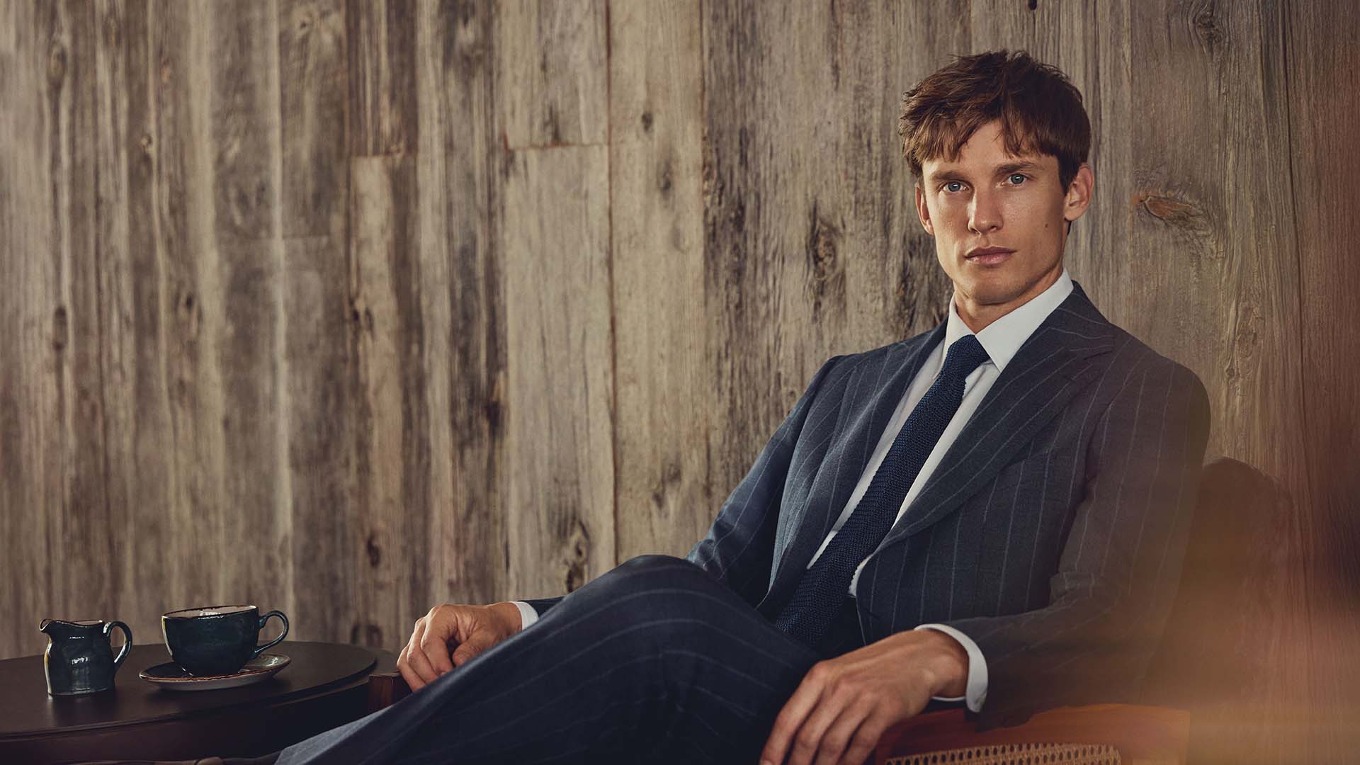 Model sat in a chair