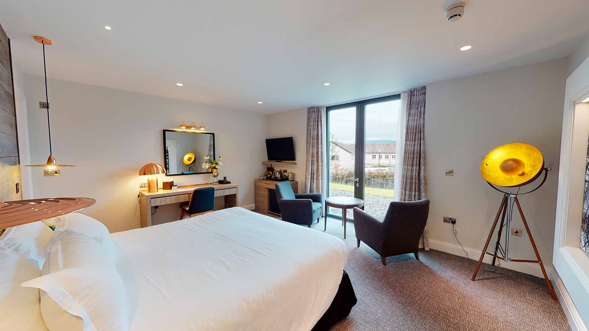 A Winander Club Hazel bedroom at Low Wood Bay Resort & Spa