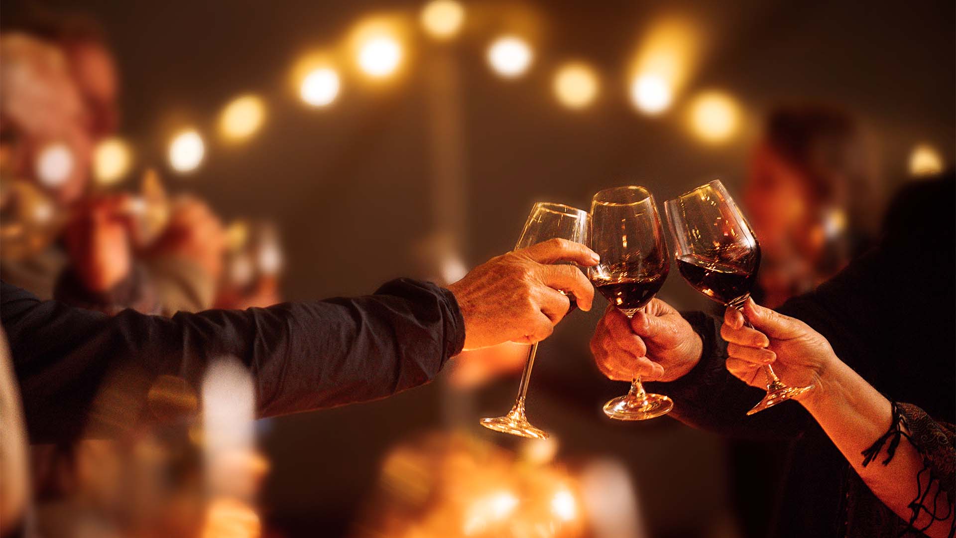 Raised glasses to cheers