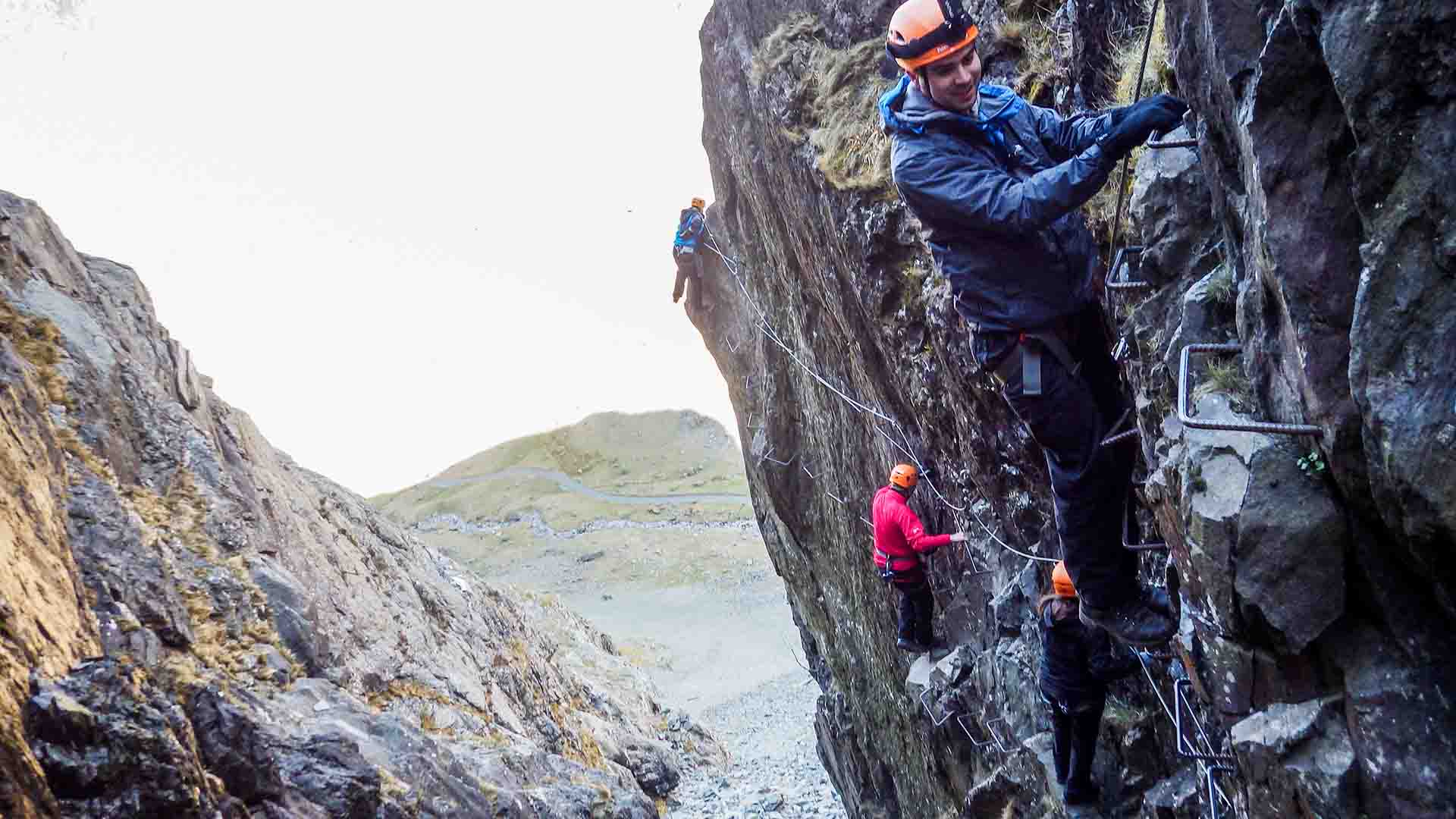 Climbers on the via ferrata in Honister Pass