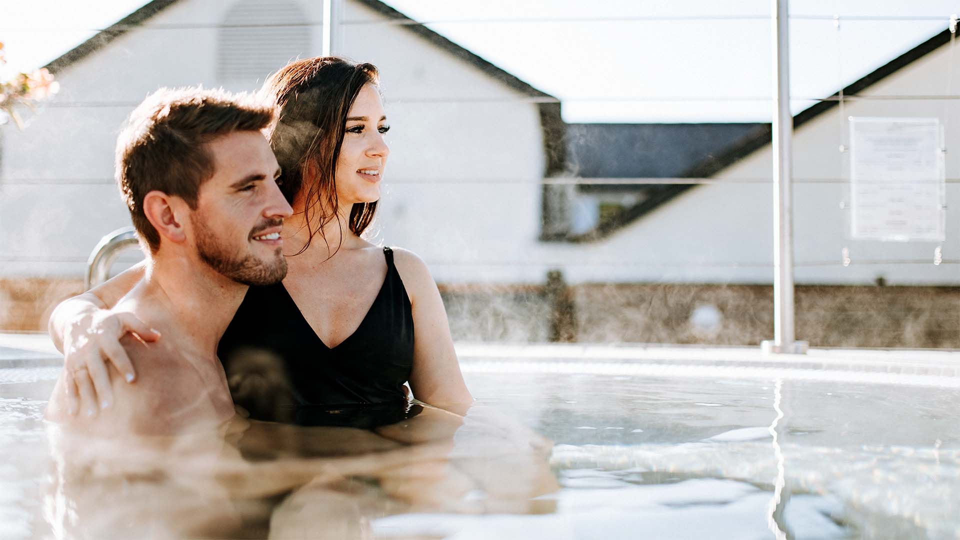 Couple in the spa's outdoor hot-tub