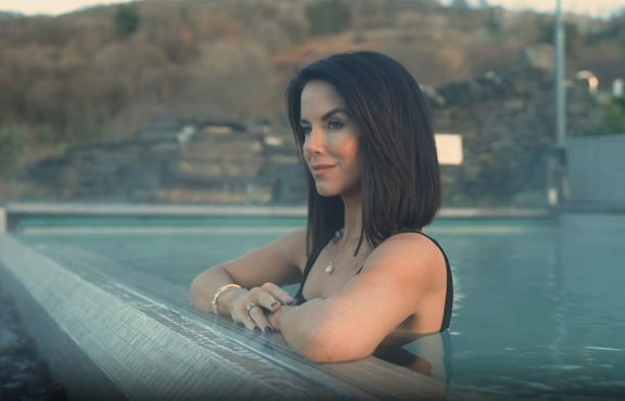 Young woman in the outdoor spa