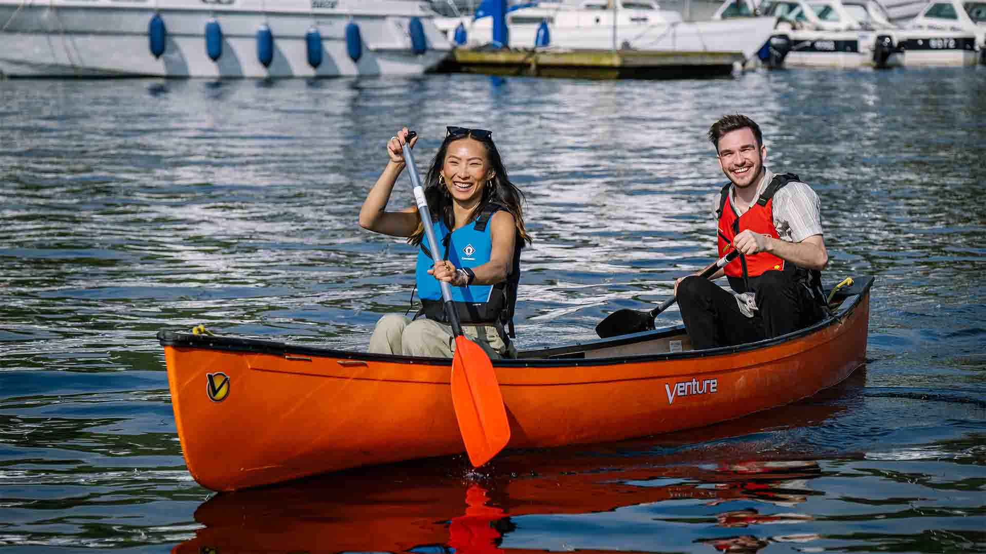 Two open canoers on lake Windermere