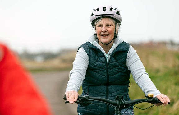 Older woman on a bike