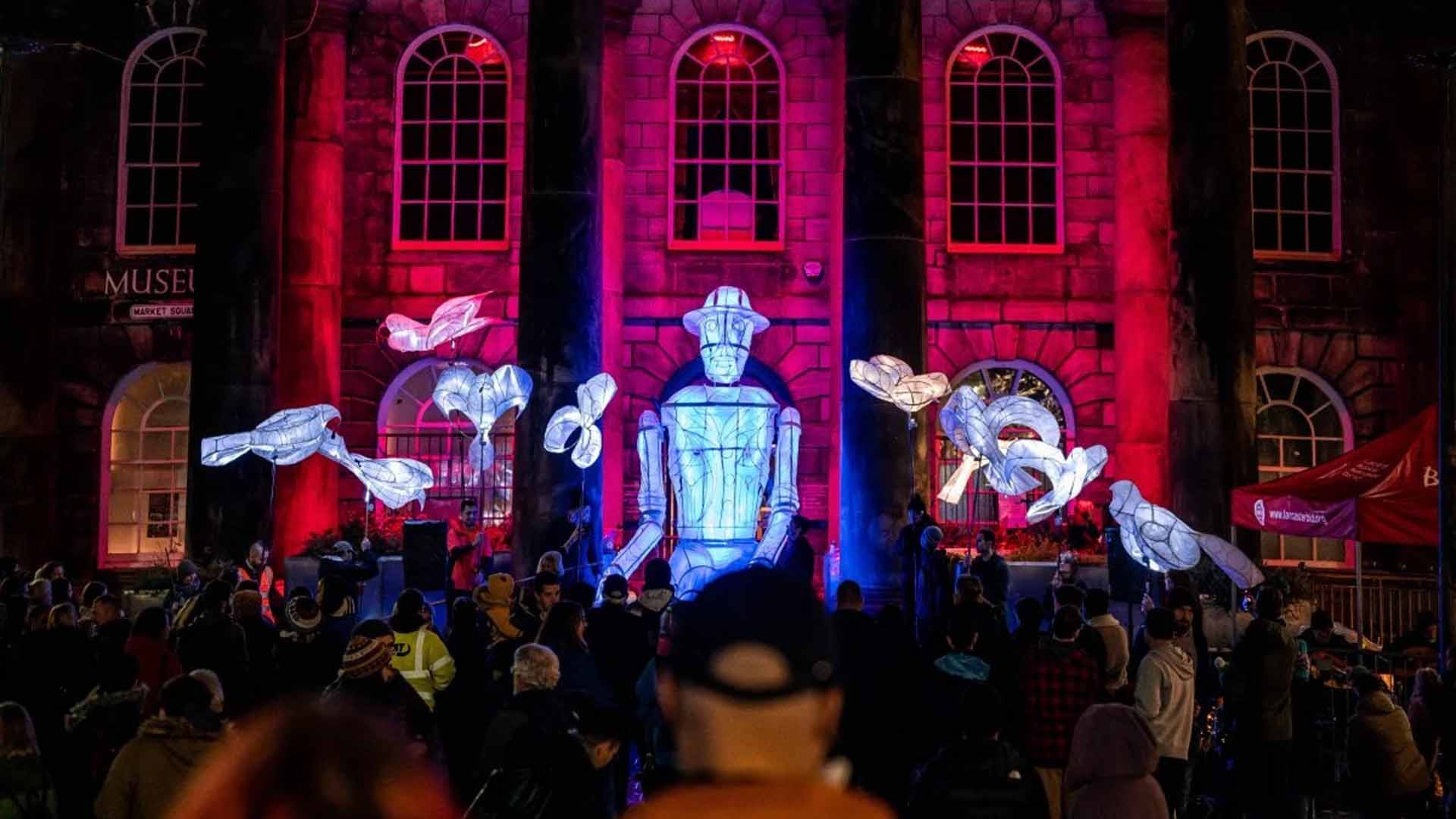 Large puppet style models paraded at night through the streets.