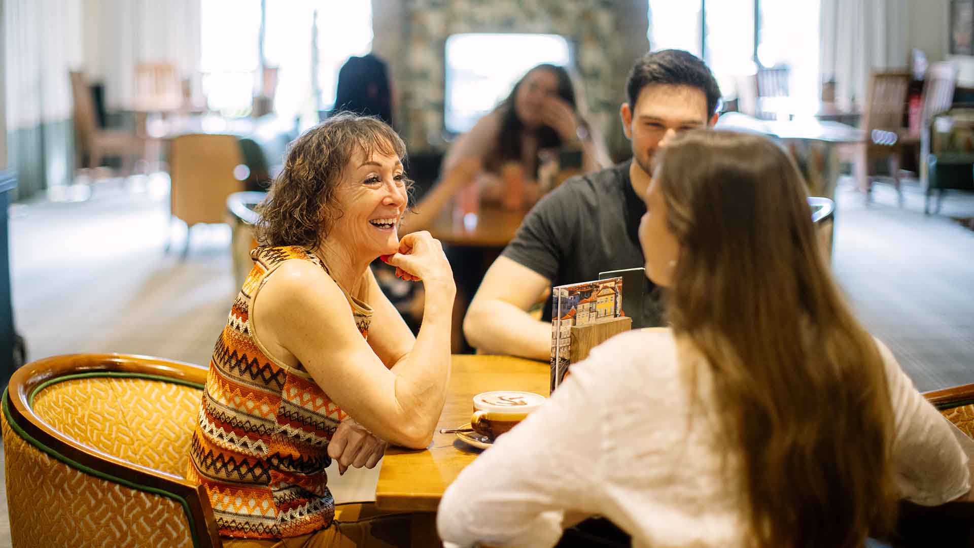 Small groups chatting in The Sandeman Bar at Lancaster House Hotel