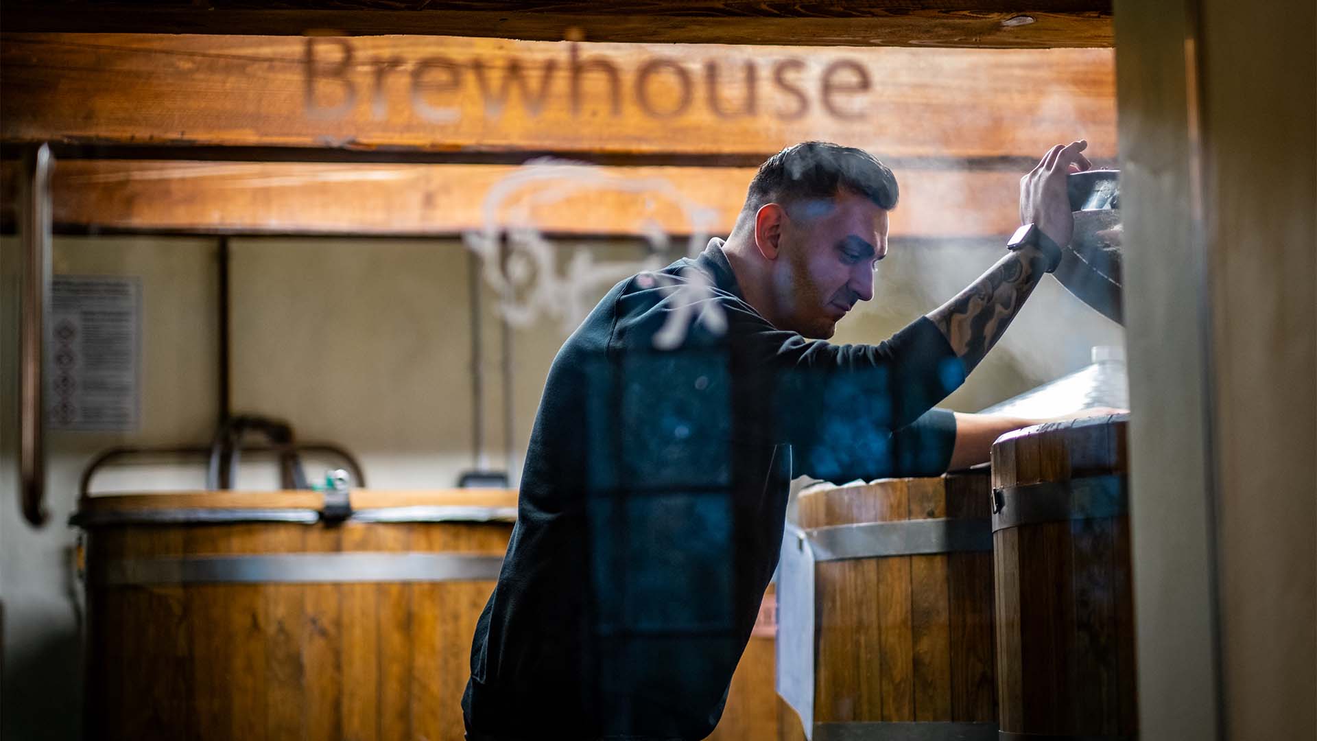 The head brewer inspecting the ales