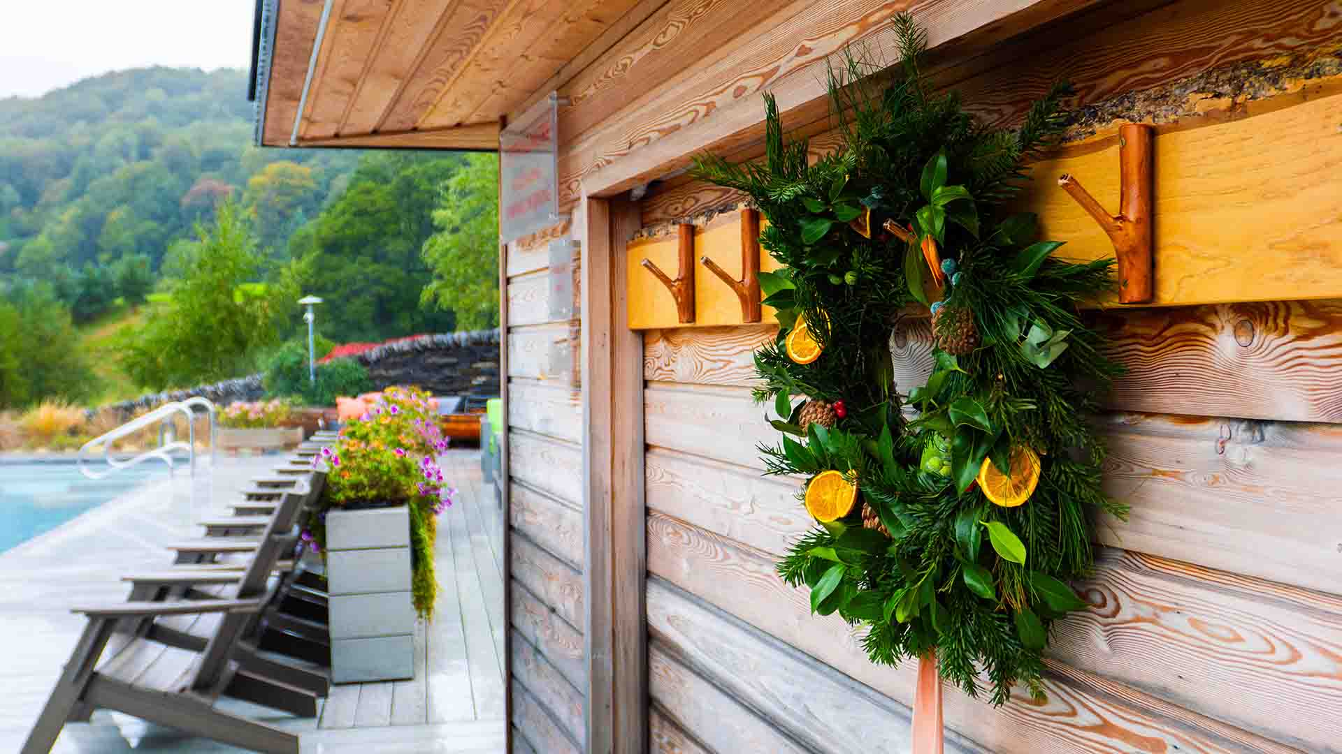 A Christmas wreath hung on the hooks outside the sauna at The Spa