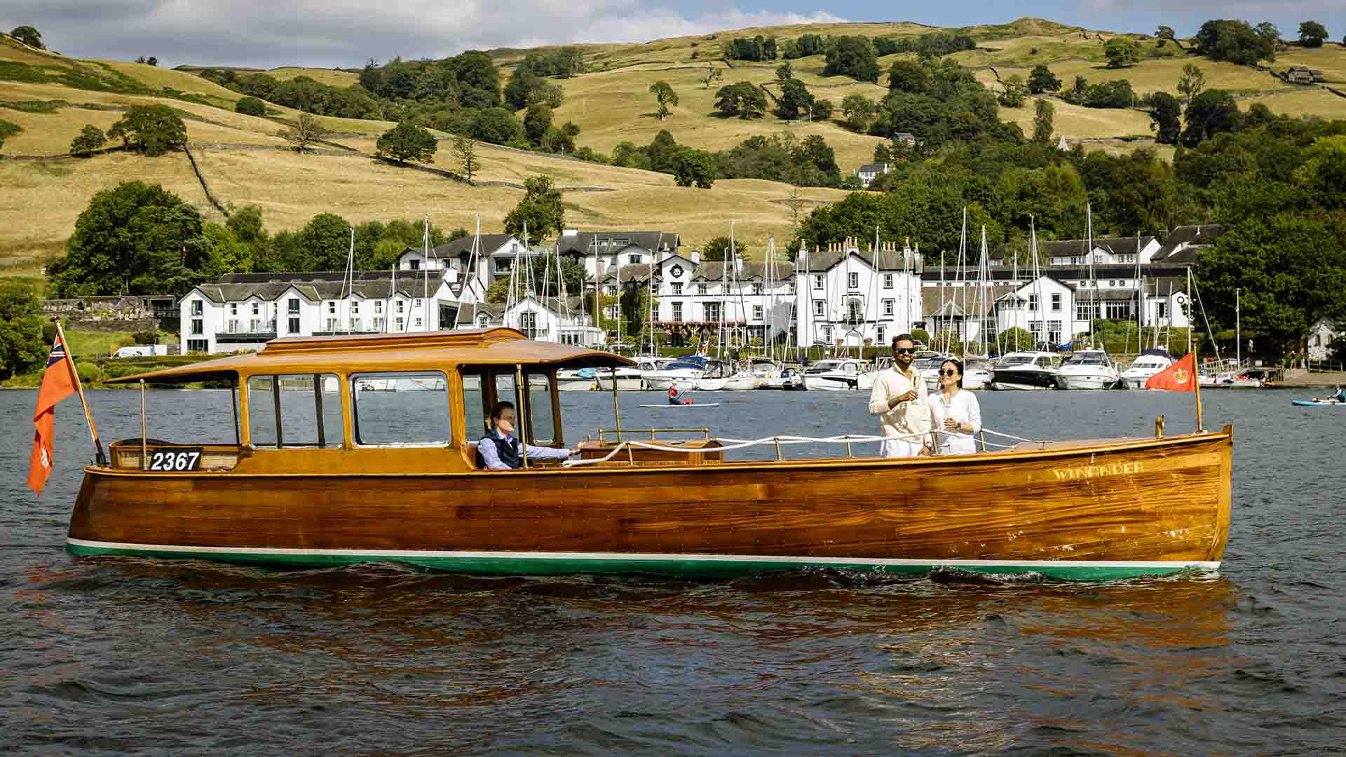 The Winander launch on Lake Windermere with Low Wood Bay behind