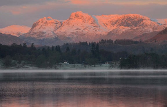 sunrise on langdale from low wood bay