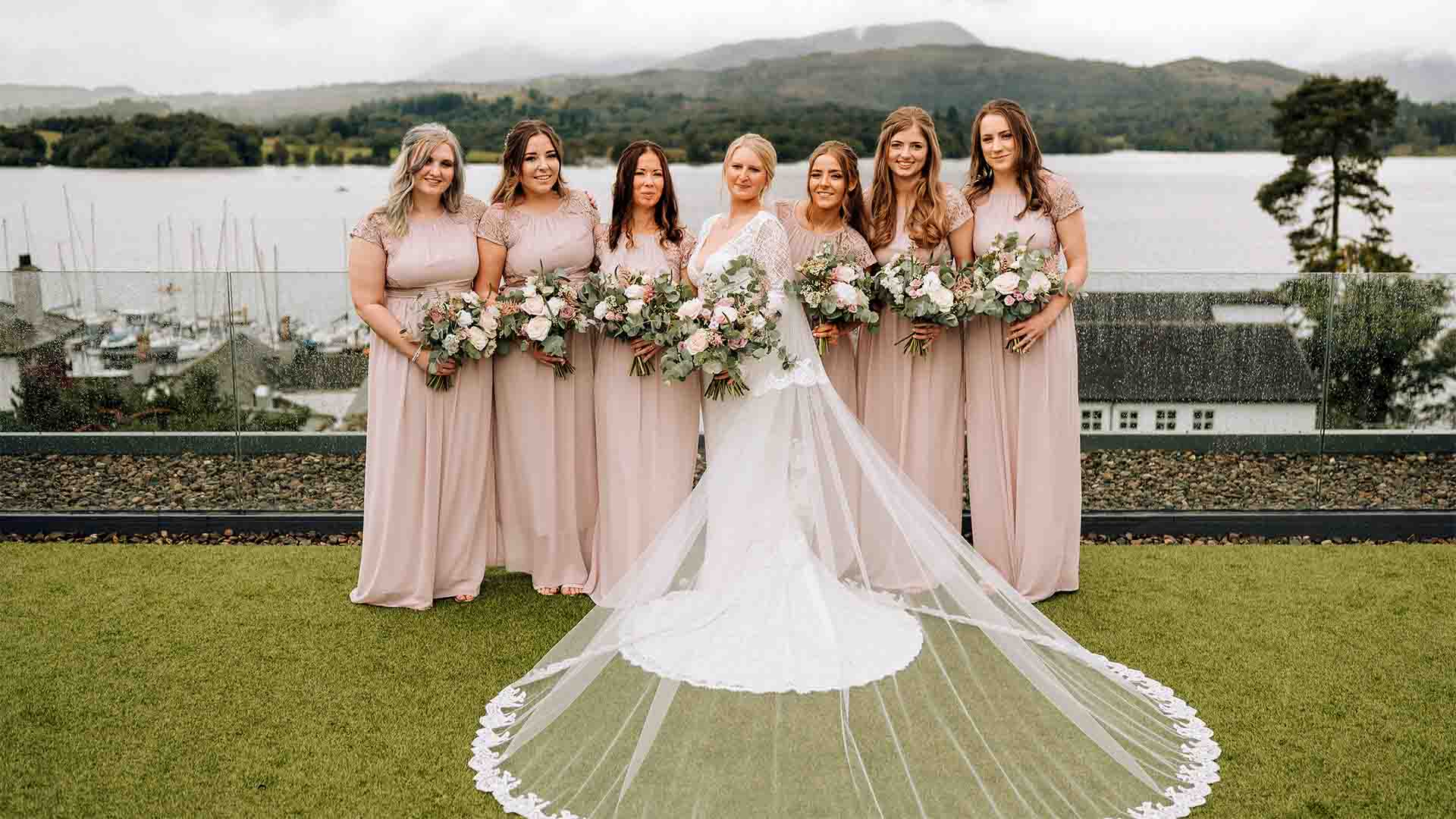 Bride and bridemaids gathered on the rooftop terrace