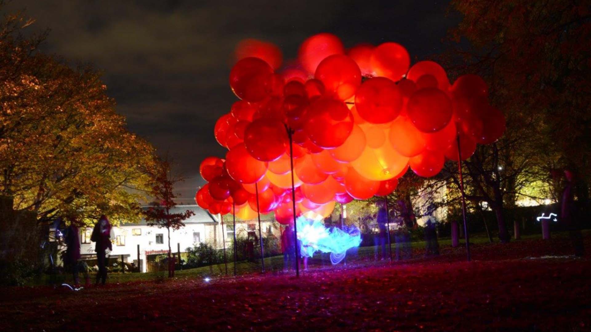 Red baloons floating in the air