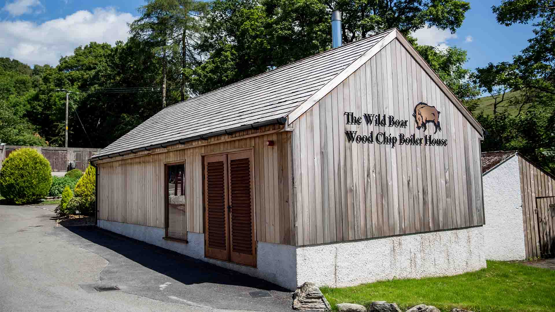 The woodchip boiler building at the Wild Boar Estate