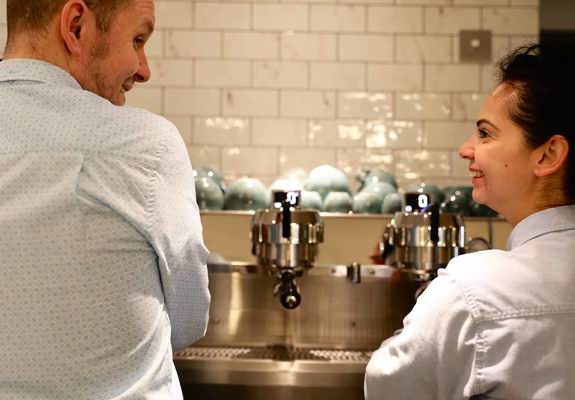 Two of the Blue Smoke team by the coffee machine