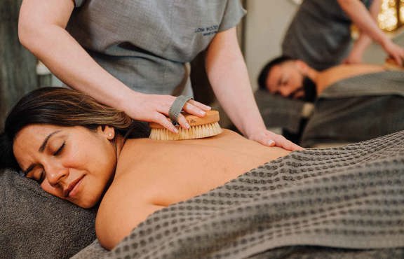 Young woman enjoying a back massage