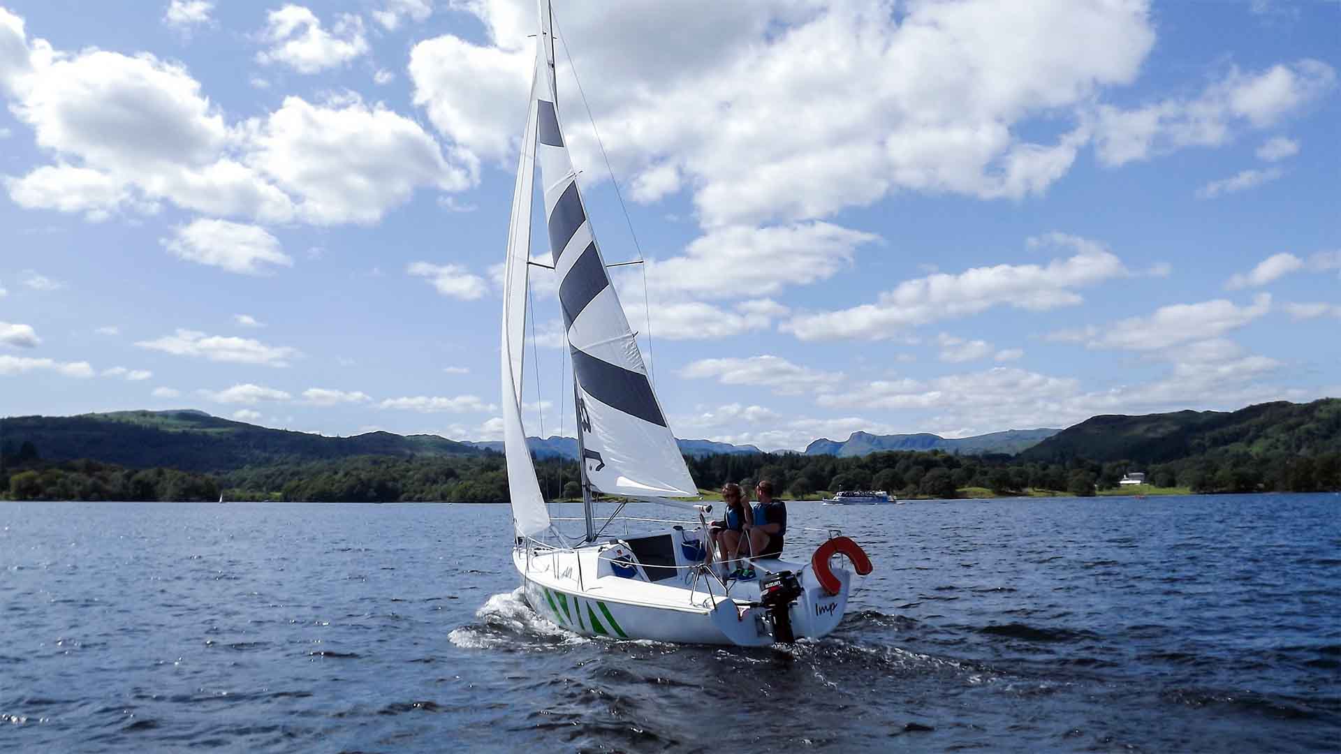 Keel sailing boat on lake Windermere on a bright sunny day