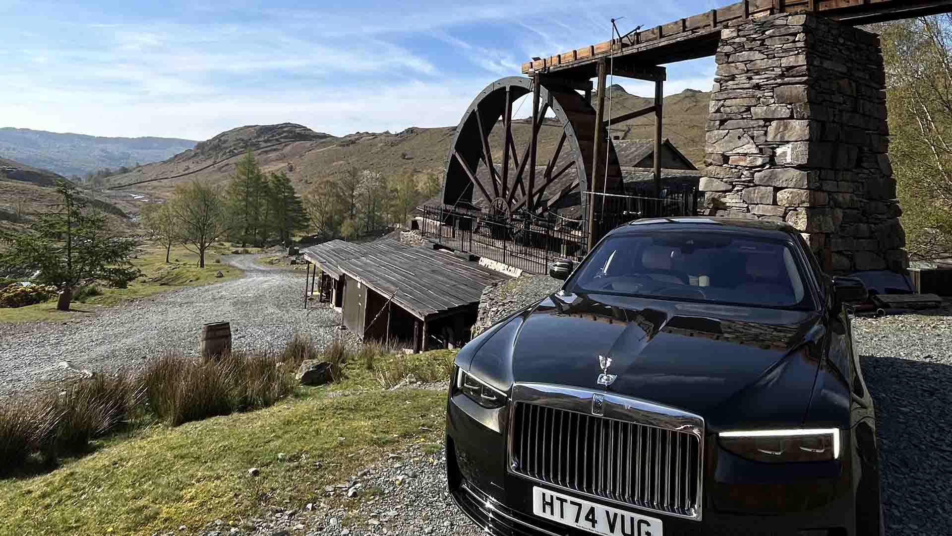 Rolls Royce parked by quarry machinery in the Lakes