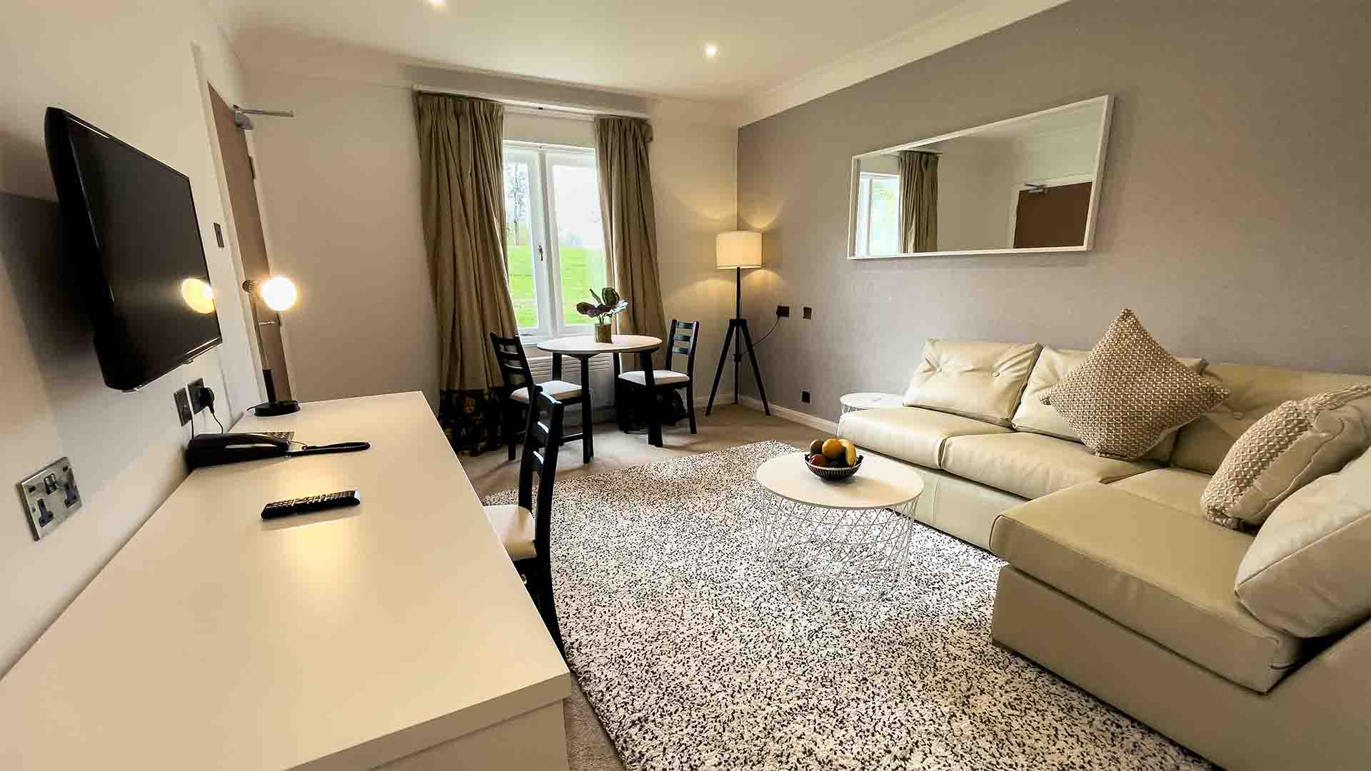 The lounge of a one bedroom apartment at Lancaster House Hotel