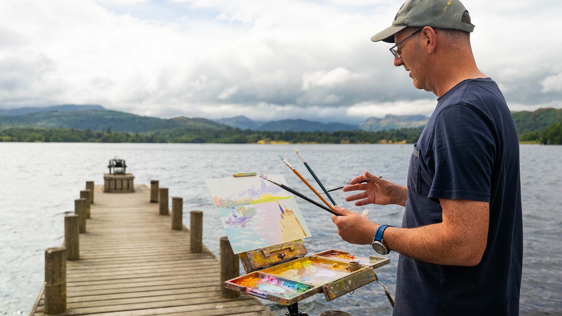Norman painting on the jetty at Low Wood Bay